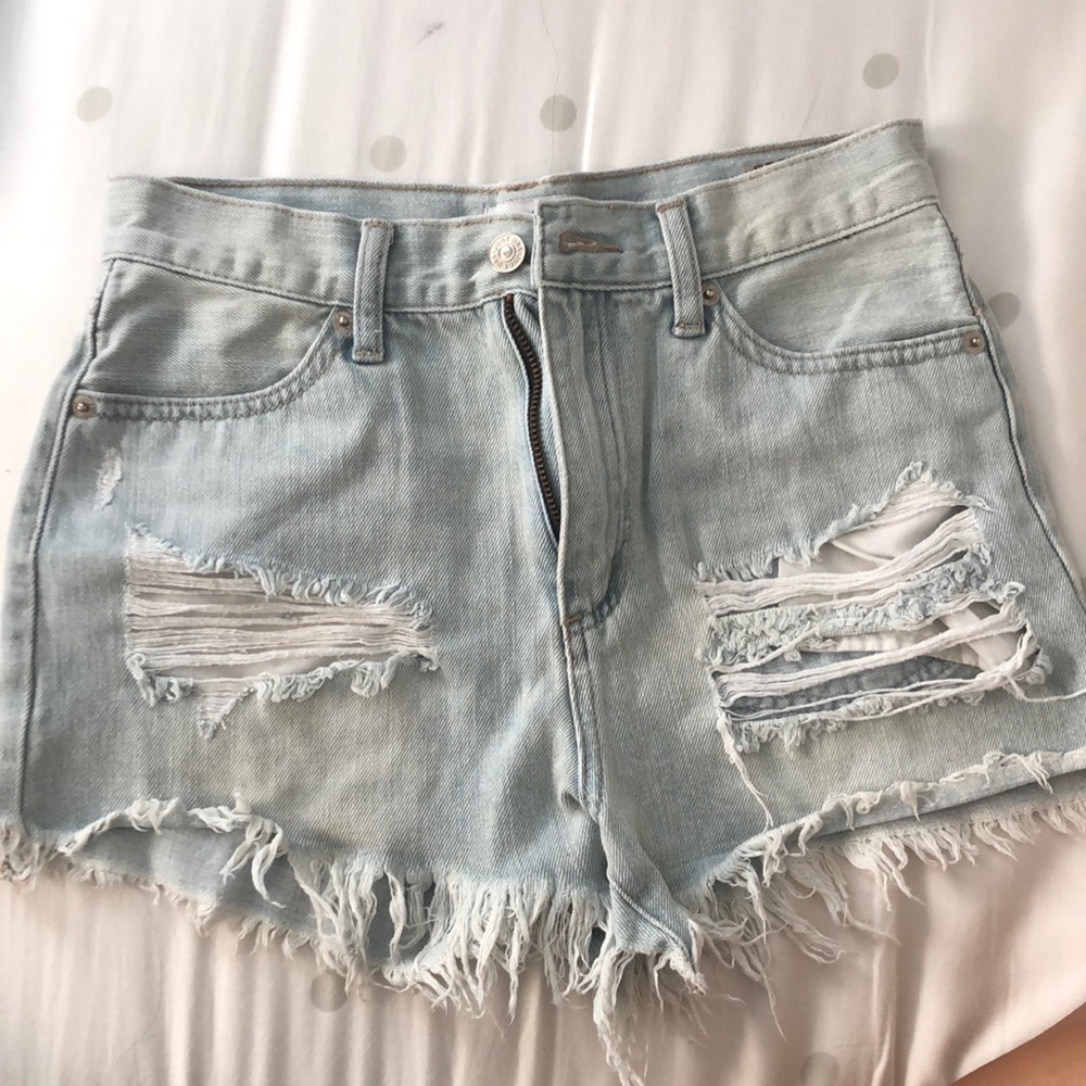 Distressed light wash denim shorts